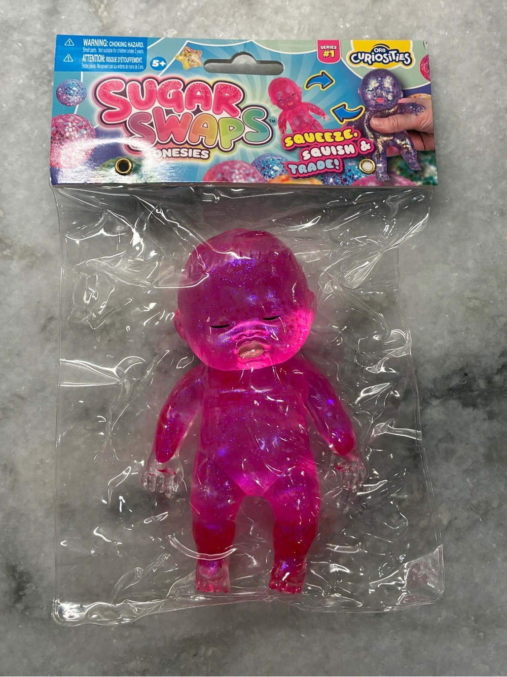 ✨ ORB Sugar Swaps Onesies Series 1 Pink Glitter Squishy Baby Fidget Toy ✨